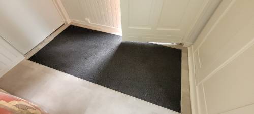 Détail tapis d'entrée