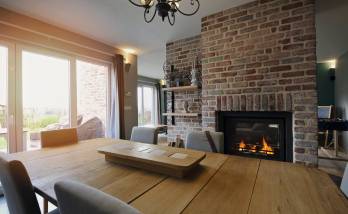 insert cheminée brique Bouc Bel Air - La Maison des Travaux