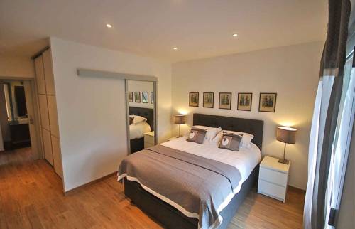 Transformation d'un garage en chambre parentale avec salle de bains