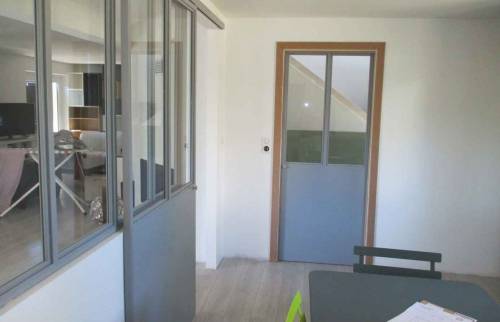 Verrière atelier et porte à galandage à Rixheim