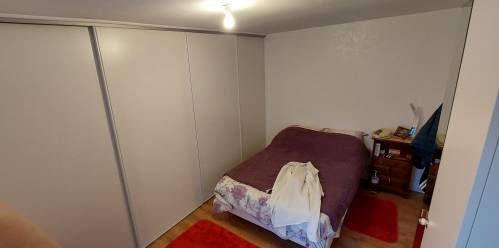 Déplacement de la cloison séparative pour création d'une plus grande chambre avec installation d'un placard