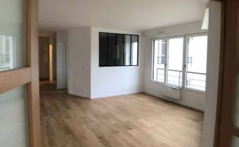 Rénovation complète du salon d'un appartement - La Maison des Travaux Paris