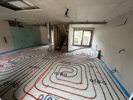 Installation d’un plancher chauffant dans une maison située à Motte Servolex