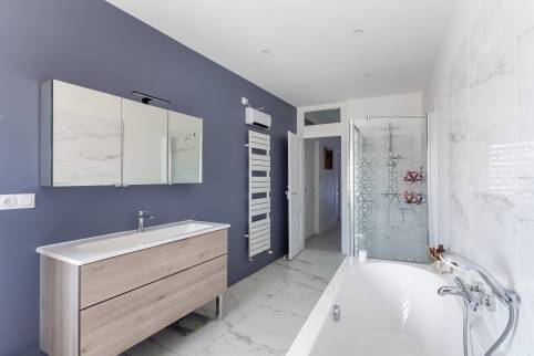 Rénovation d'une maison de famille avec construction d'un garage double