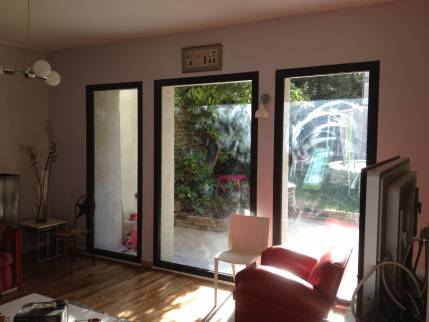 Transformation d'une fenêtre en porte-fenêtre près de Landerneau (29)