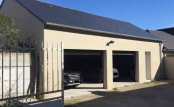 Construction garage double avec porte à Biarritz