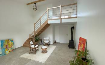 Espace de vie avec mezzanine La Maison des travaux sainte genevieve des bois