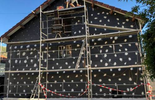 Pose des panneaux d'isolation