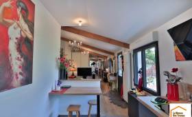 Agrandissement d'une maison avec toiture inclinée