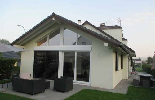 Extension de maison, terrasse en dalle, baie vitrée à Saint Louis