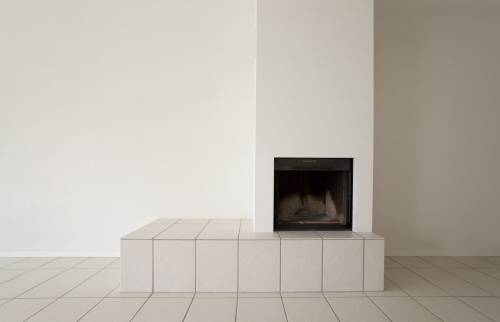 Installation d'une cheminée dans un salon 