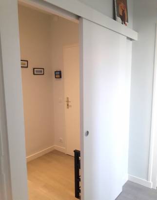 Porte coulissante en applique