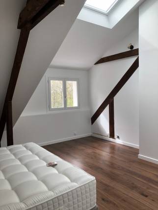 Plaquage dans le respect des poutres existantes