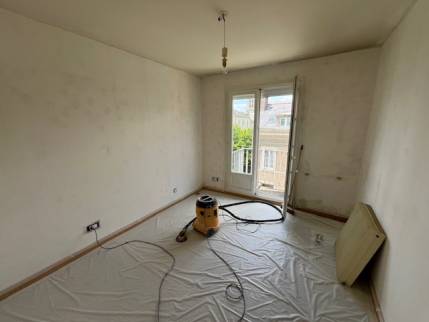 Travaux de rénovation de murs de salon dans un appartement - Nantes 44