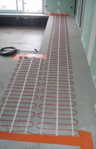 Pose d'un chauffage au sol électrique pour le SPA à SEILLAC (41)