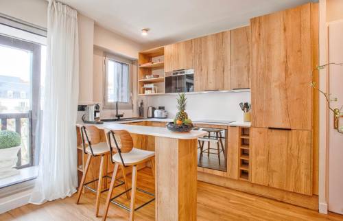 La cuisine ouverte sur le salon