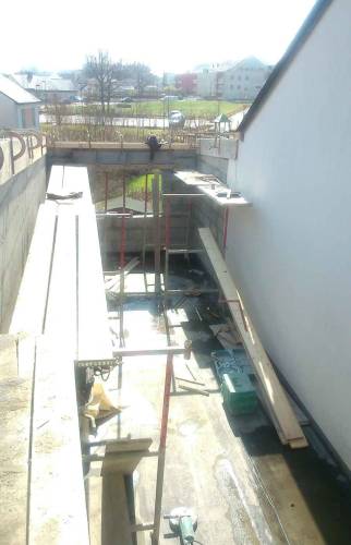 Elévation murs parpaings  sur ancien toit plat - Orvault
