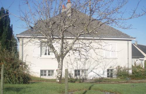 Autre façade après travaux, avec reprise passes de toit