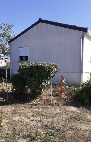 Vue sur le pignon arrière avant ravalement