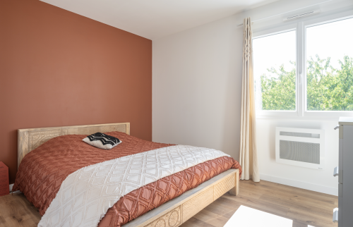 Surélévation d'une maison en ossature bois de 30 m² aux Sorinières - chambre