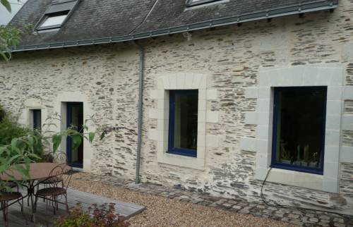 Rénovation porte et fenêtres ravalement et nouveau revêtement de façade en pierre de parement décoratif - Vauréal (95490)