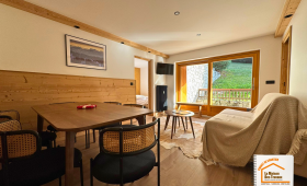 aménagement chambre appartement montagne, tête de lit sur mesure, rangements intégrés Méribel, chambre avec lits superposés, décoration chambre montagne