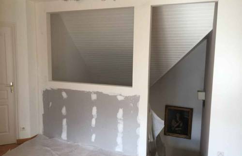 Préparation pour mettre en place une verrière d'atelier 