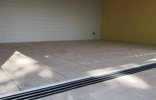 Pose du carrelage sur chape liquide (91)