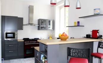 Rénovation complète de cuisine avec alignement équipements linéaire mural et création espace repas à Cergy-Pontoise (95800)