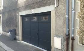 Pose d'une porte de garage avec portillon à Caen