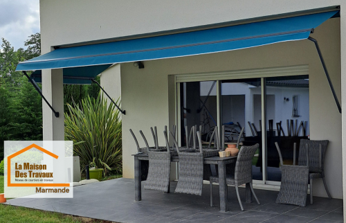 Aménagement de terrasse à Brax avec store motorisé solution idéale pour se protéger du soleil et profiter d’un espace de vie extérieur