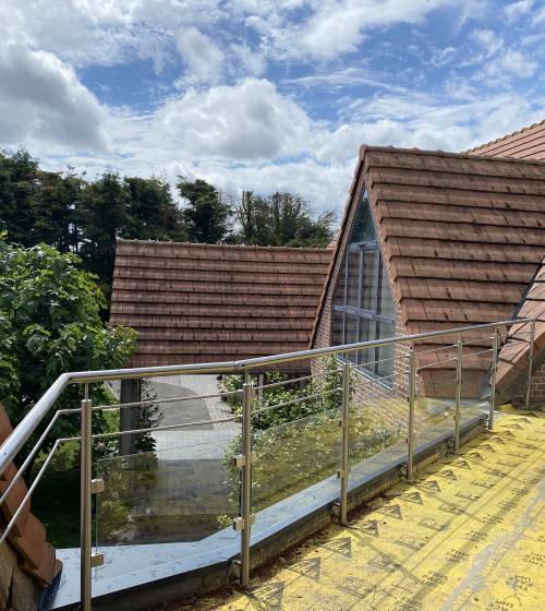 Pose d'un isolant au sol de la terrasse de toit 