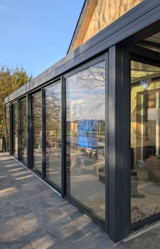 Après - Vue de près de la nouvelle véranda performante et lumineuse