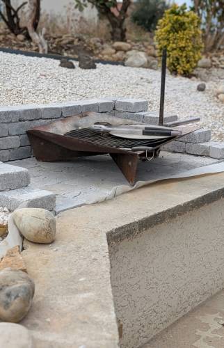 Création d'un espace brasero intégré à l'aménagement paysager du jardin