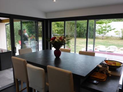  Espace salle à manger dans la nouvelle véranda - Villebrumier 82