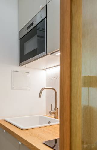 Placards verts pour une cuisine élégante et apaisante