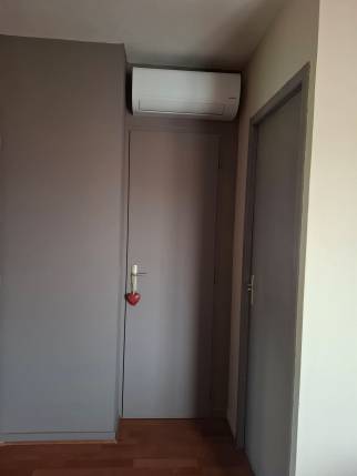 Installation de climatisation réversible dans une chambre à l'étage - Meximieux 01800