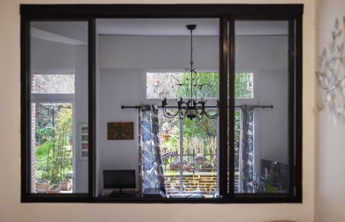 Verrière coulissante acier