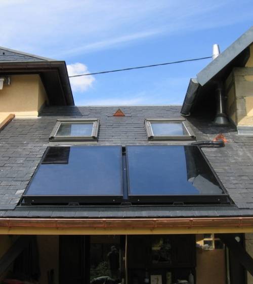 Pose de deux panneaux thermiques sur toit de véranda - Crécy-la-Chapelle - 77580 -