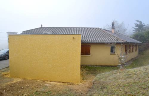Construction d'un garage accolé à une maison à Champier