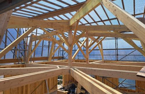 Surélévation d'une maison en ossature bois pour ajouter un plein étage