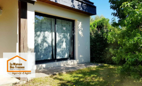 Rénovation à Brax : remplacement de menuiseries anciennes par une baie vitrée moderne en PVC double vitrage.