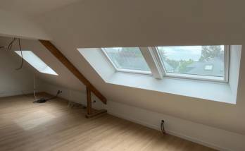 Travaux d'aménagement de combles avec pose de grandes fenêtres de toit jumelées - Nantes 44