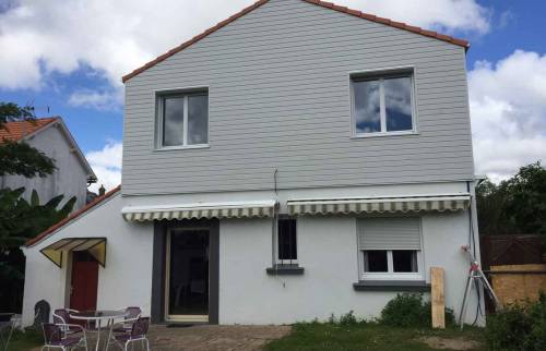 Surélévation de 60 m² à Rezé en bardage bois