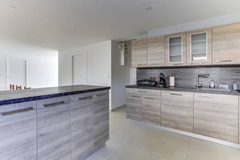 Rénovation complète d’une maison avec aménagement d’un garage transformé en séjour cuisine à Neuville sur Saône