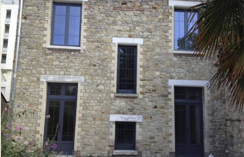 Changement des fenêtres et de la porte d'entrée d'une maison en rénovation à Sainte-Luce-sur-Loire 44980 près de Nantes