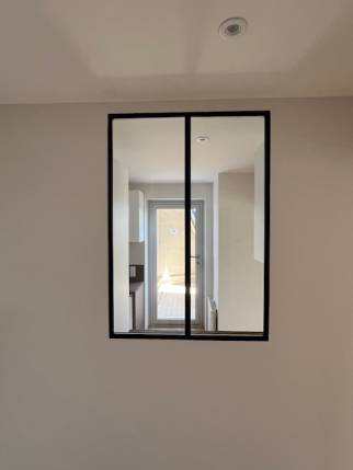 Verrière intérieure et porte-fenêtre en aluminium posée lors d'une rénovation d'appartement - Nantes 44000