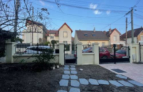 Rénovation de clôture et de revêtement de sol extérieur à Massy