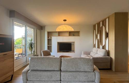 Agencement de la pièce de vie après une rénovation d'intérieur à Écully (69130)