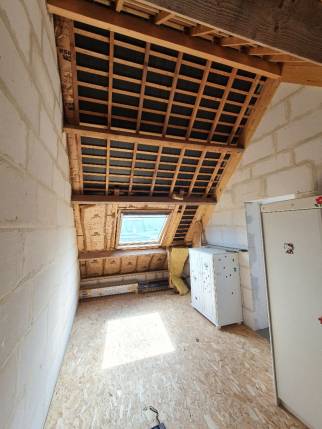 Vue de l’espace sous toiture avant l’aménagement de combles au-dessus du garage